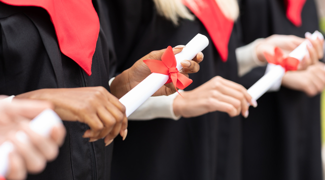 Carousel_unrecognizable-multiracial-group-of-graduates-hold-2025-03-18-17-34-02-utc