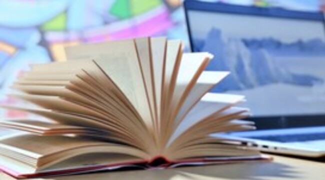 Carousel_normal_open-book-on-the-table-close-up-of-a-fanned-book-2025-01-10-03-09-29-utc