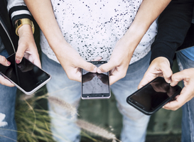 Normal_group-of-people-using-their-phones-with-green-back-2025-03-09-04-31-09-utc