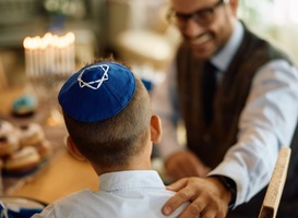 Normal_rear-view-of-jewish-boy-talking-to-his-father-2024-12-13-17-10-43-utc__1_