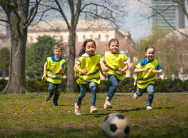 Normal_small-children-playing-football-outdoors-in-city-p-2024-10-20-17-18-57-utc
