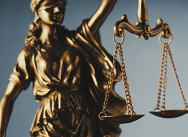 Normal_figure-of-justice-holding-the-scales-of-justice-2025-01-09-10-17-56-utc